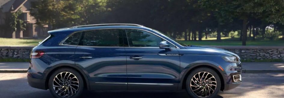 Blue 2019 Lincoln Nautilus parked on side of street